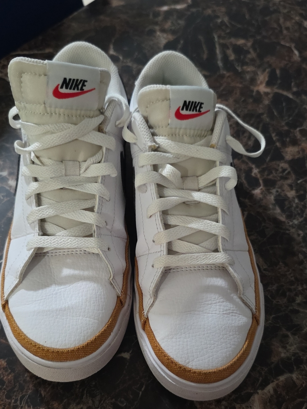 Nike Men’s White Sneakers with Brown Trim and Red Swoosh